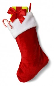 38254082 - christmas stocking with presents isolated on white background.